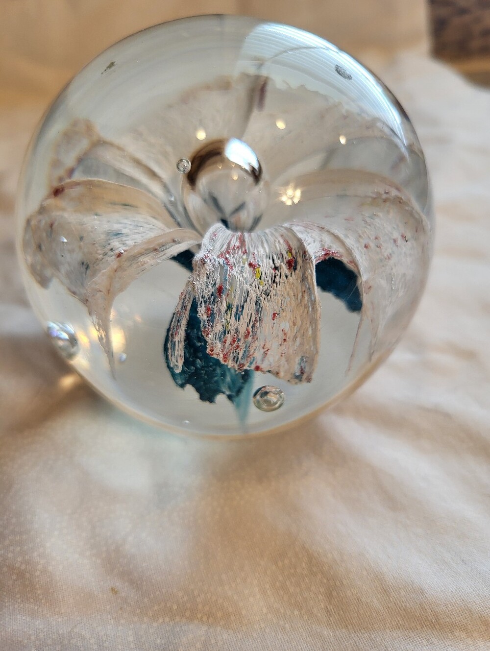 Handblown Glass Art 3 x 3 In. Sphere with White and Teal Floral Core Paperweight